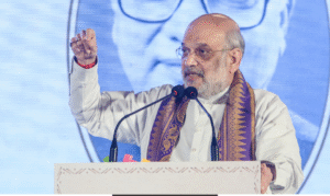 ஆமதாபாத்தில் நடைபெற்ற நிகழ்ச்சியில் பேசும் உள்துறை அமைச்சர் அமித் ஷா