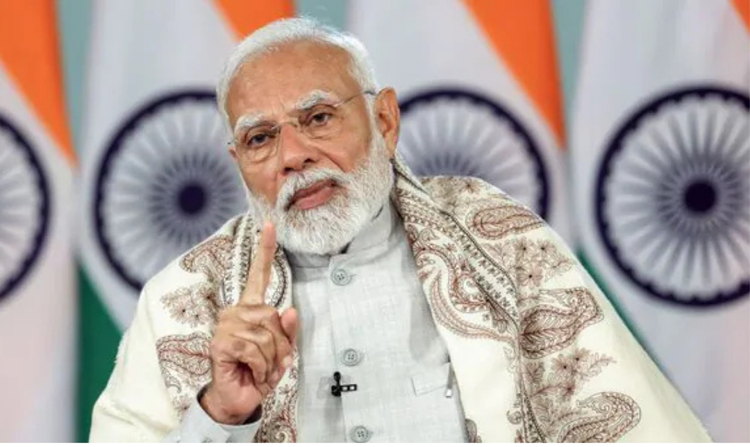 மேற்கு வங்க தேர்தல் பிரசார கூட்டத்தில் பேசிய பிரதமர் நரேந்திர மோடி.