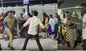 திருப்பூர் வீரராகவ பெருமாள் கோவிலில் பாதுகாப்பு பணியில் இருந்த போலீசார், கத்தி தாக்குதல் முயற்சியில் ஈடுபட்ட நபரை பிடித்த காட்சி