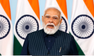 குஜராத் ராஜ்கோட்டில் நடந்த நிகழ்ச்சியில் உரையாற்றும் பிரதமர் நரேந்திர மோடி