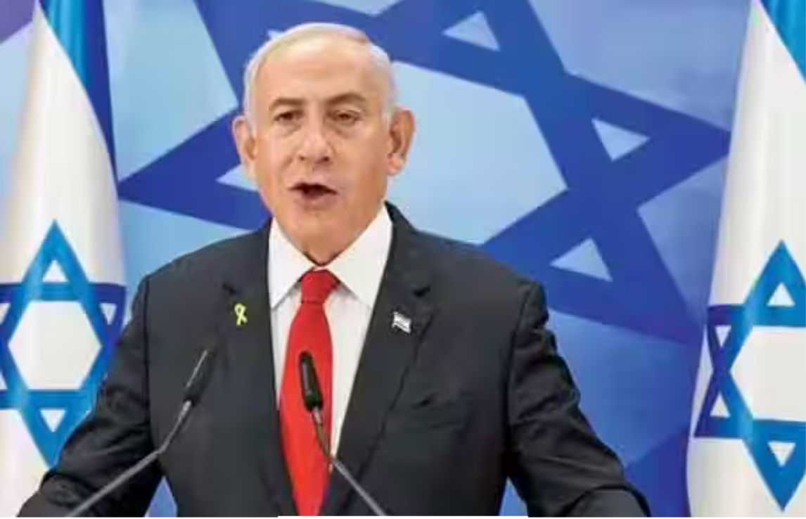 வீடியோவில் உரையாற்றும் இஸ்ரேல் பிரதமர் மற்றும் பின்னணியில் ஜெரூசலம் நகர காட்சி.