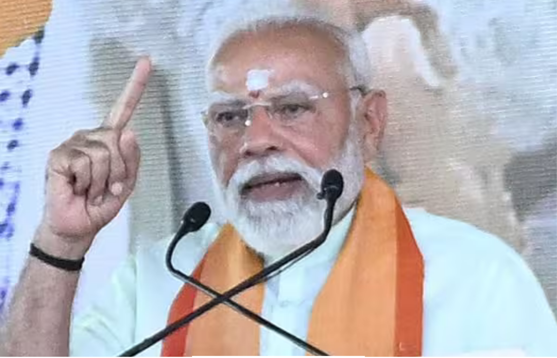 மதுரை பொதுக்கூட்டத்தில் உரையாற்றும் பிரதமர் நரேந்திர மோடி.