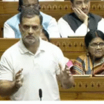 லோக்சபாவில் பேசி வரும் ராகுல் காந்தி மற்றும் உறுப்பினர்கள் சிரிக்கும் காட்சி