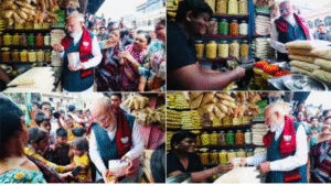 மேற்கு வங்கத்தில் சாலையோர கடையில் ஜல்முரி வாங்கும் பிரதமர் மோடி