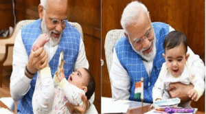ராம் மோகன் நாயுடுவின் குழந்தைகளுடன் விளையாடும் பிரதமர் நரேந்திர மோடி