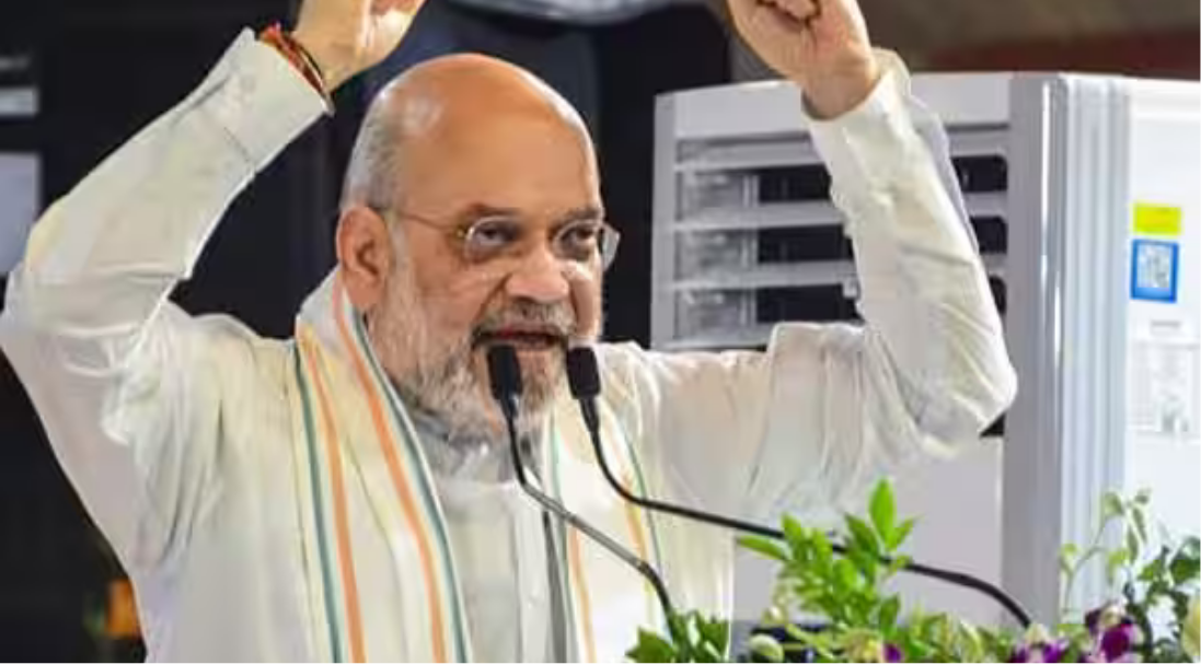 பழங்குடியின மாநாட்டில் உரையாற்றும் மத்திய அமைச்சர் அமித் ஷா